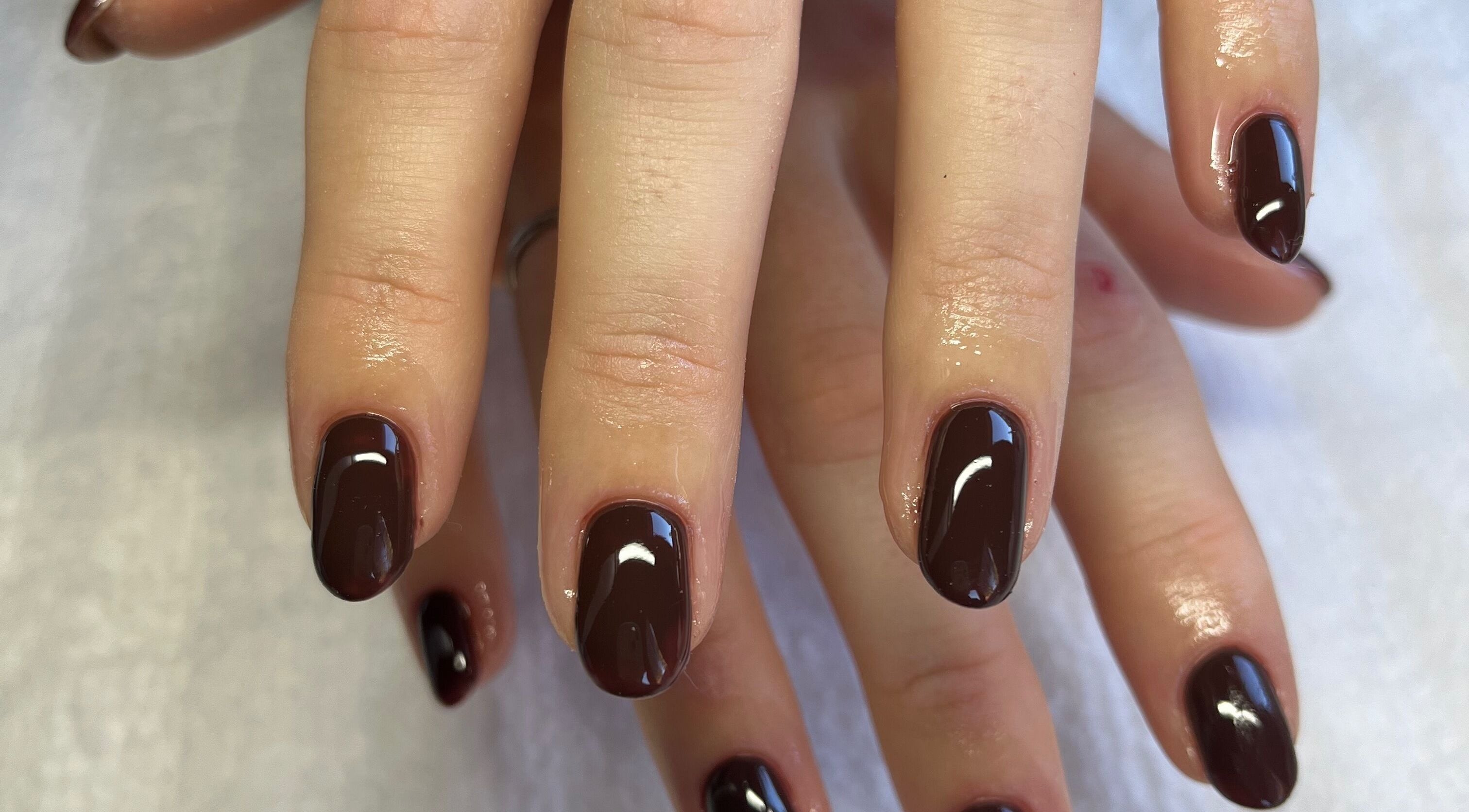 Elegant dark manicure at The Little Lash Lodge, Rustington, Littlehampton, England, GB.