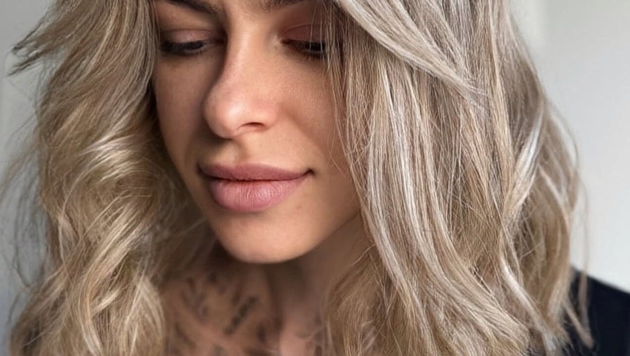 Blonde hair styled at Beauty Salon in San Diego, California, US, showcasing elegance and beauty.