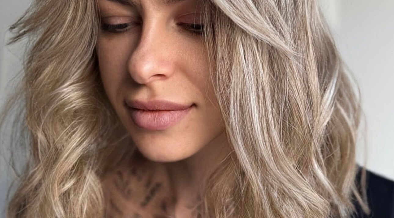 Blonde hair styled at Beauty Salon in San Diego, California, US, showcasing elegance and beauty.