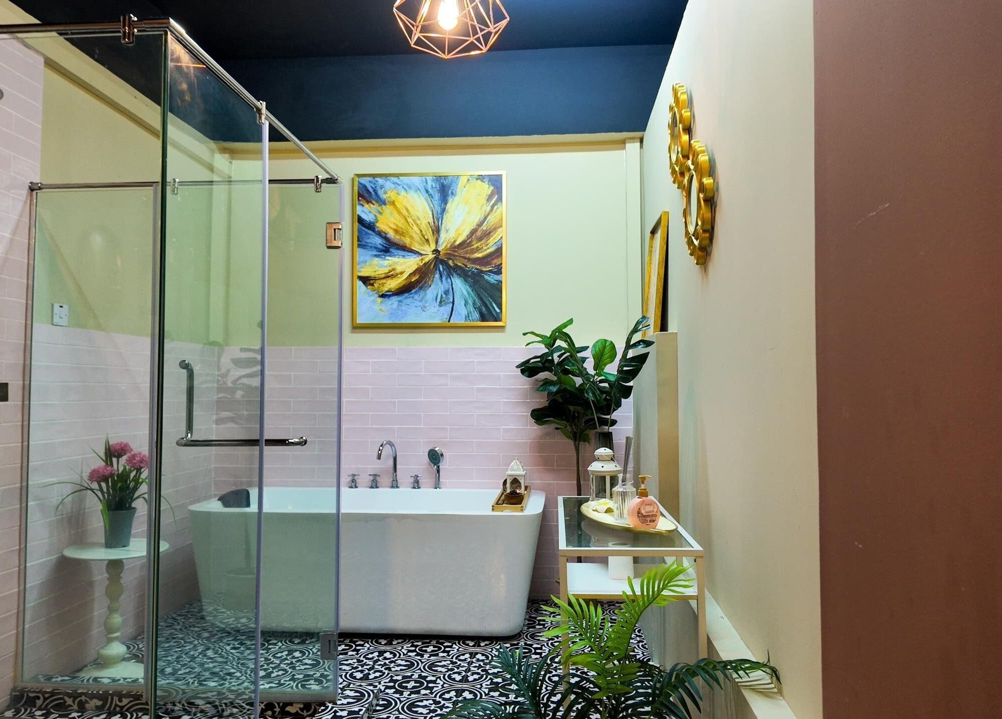 Elegant bathroom with a tub at Qasandra Spa Retreat, Petaling Jaya, Selangor, MY, offering a tranquil experience.