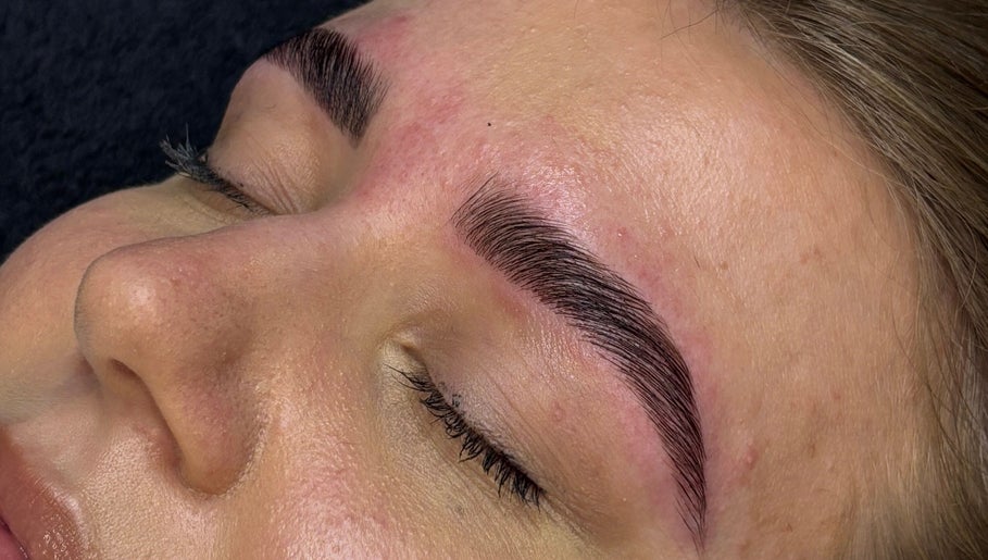 Close-up of beautifully shaped eyebrows at Grace Aesthetics, Cape Town, Western Cape, ZA.