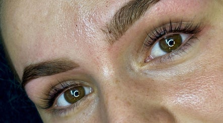 Close-up of expertly groomed brows at Grace Aesthetics, Cape Town, Western Cape, ZA, showcasing natural beauty.