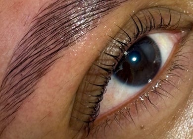 Close-up of expertly shaped brows at Grace Aesthetics, Cape Town, Western Cape, ZA.