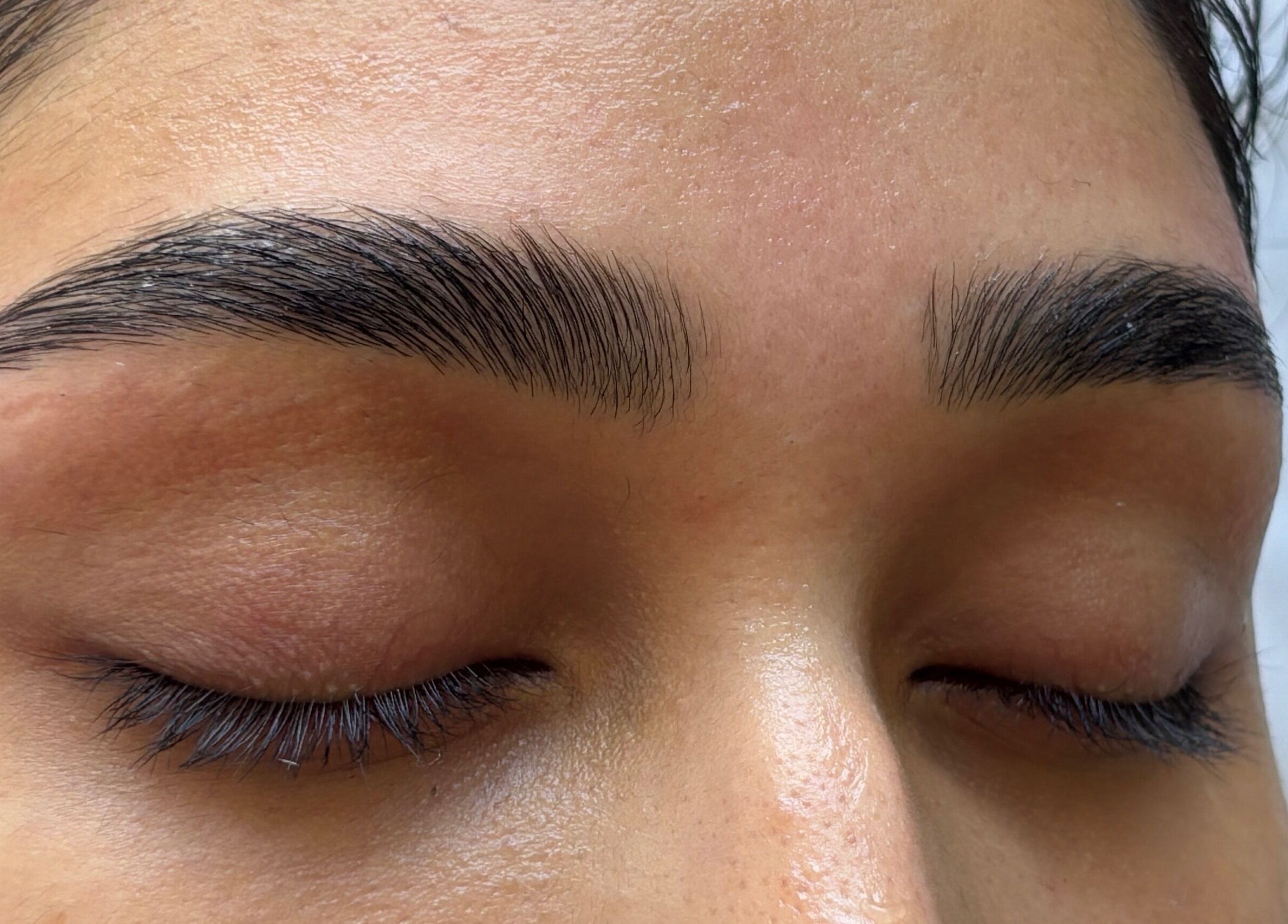 Beautifully shaped eyebrows at Grace Aesthetics, Cape Town, Western Cape, ZA, showcasing expert care.