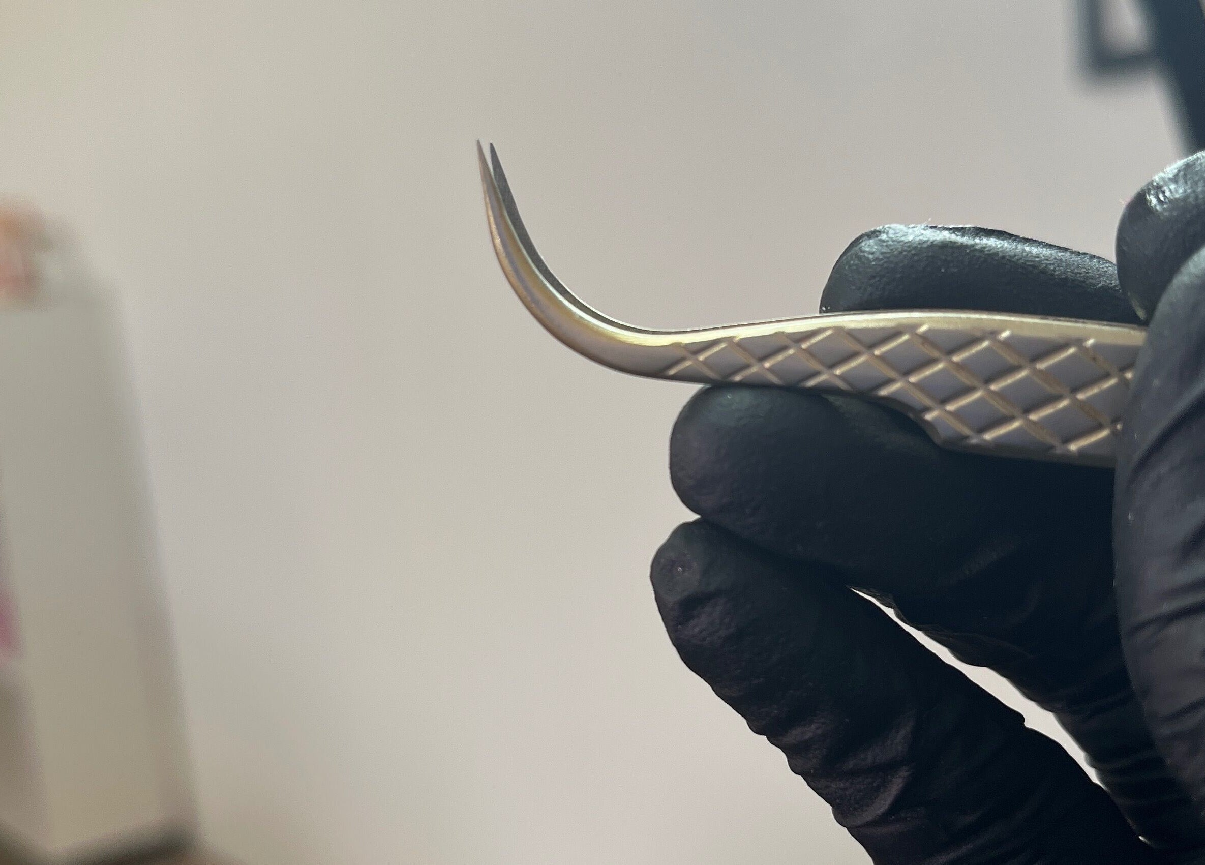 Close-up of a lash tool at Zensationalbeautycare, Paramaribo, Paramaribo, SR, used for precise beauty treatments.