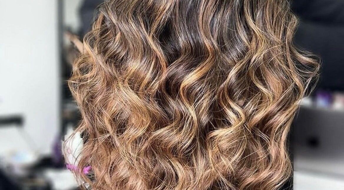 Gorgeous wavy hair extensions at Perfect Blend Extensions in Morley, England, GB offering stunning style.