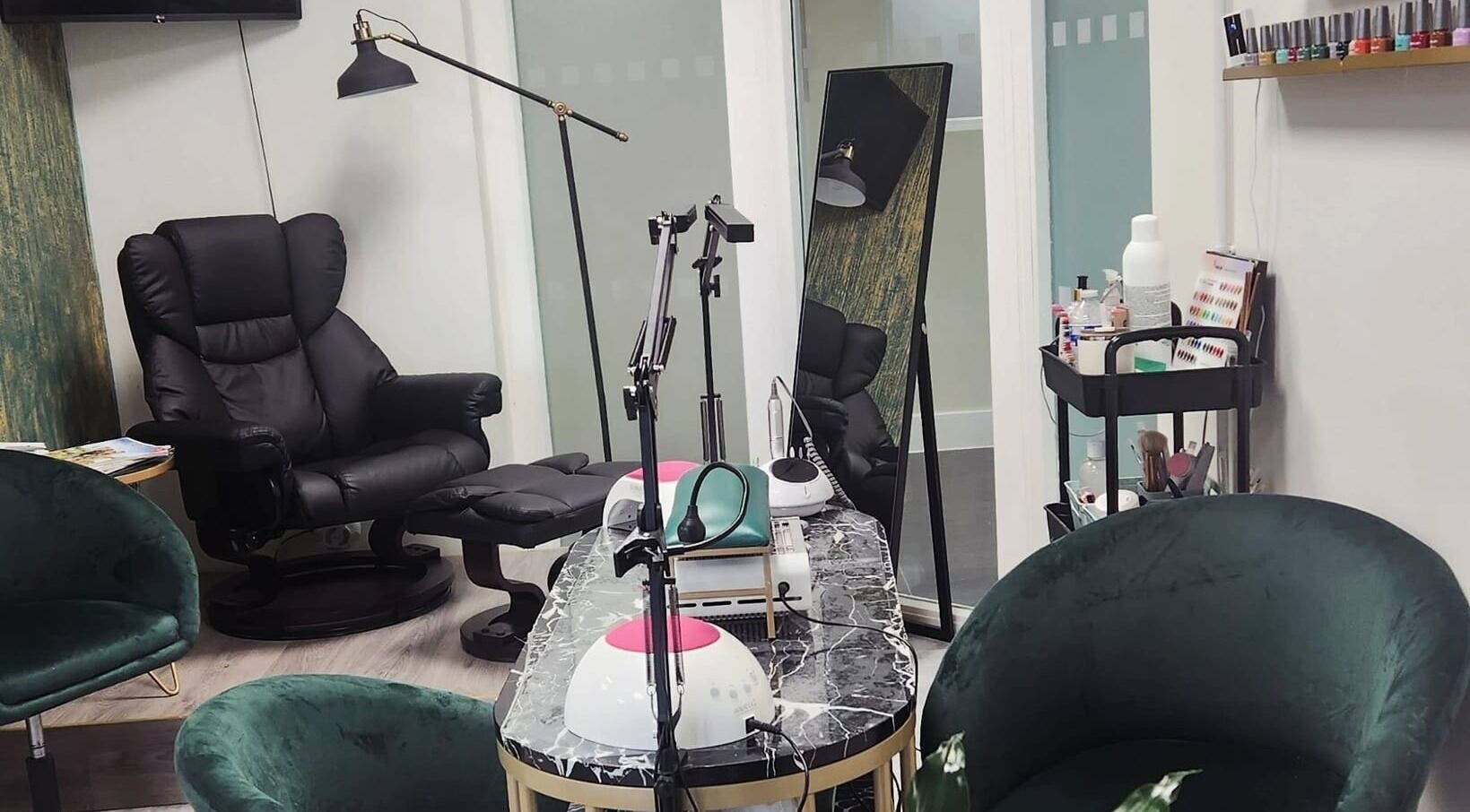 Chic salon interior at Maketimeforyou, Houghton Regis, England, GB with plush chairs and manicure stations.