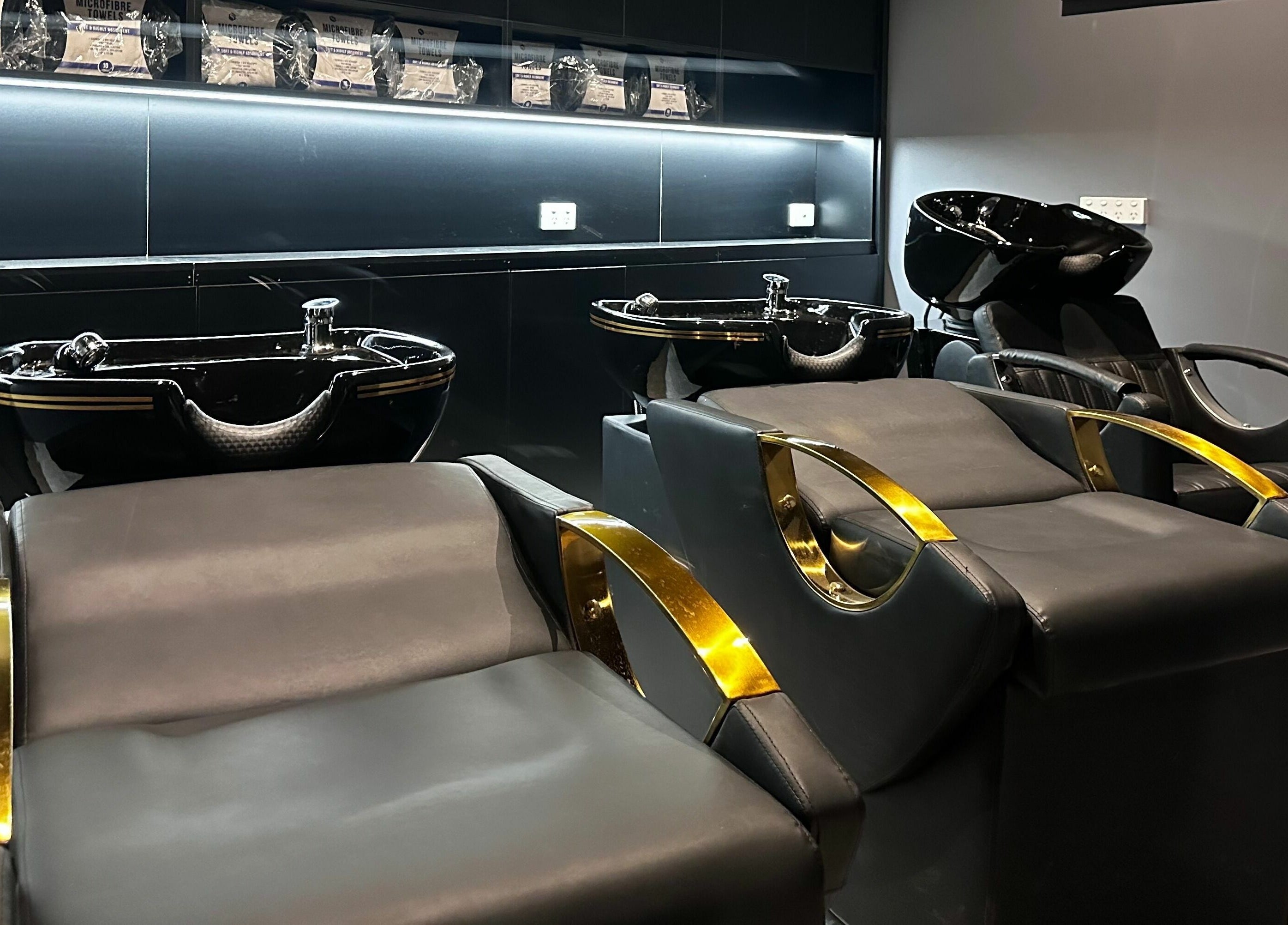 Elegant wash stations at The One Fashion Hair in Melbourne, Victoria, AU offering premium hair care services.