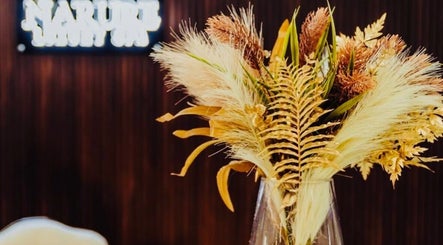 Elegant floral display at Narure Luxe Aesthetics, Emalahleni, Mpumalanga, ZA, enhancing the serene ambiance.