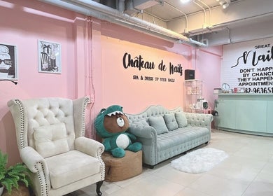 Cozy lounge at Chateau de Nails BKK, Amphoe Bang Phli, Samut Prakan, with elegant seating and decor.