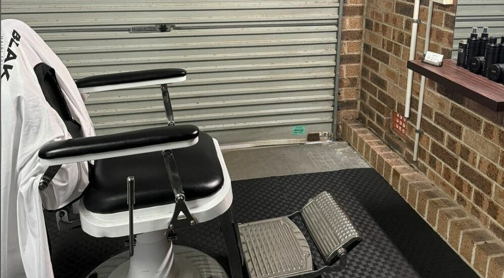 Modern barber chair at Kavi's Kutz, Kariong, New South Wales, AU, showcasing sleek design and comfort.