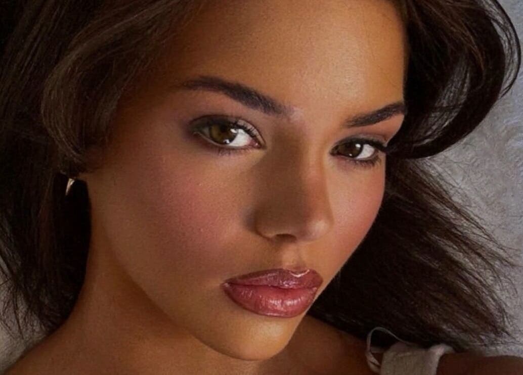 Close-up of makeup at Aesthetics by Danielle, Glasgow, Scotland, GB, showcasing radiant skin and bold lips.