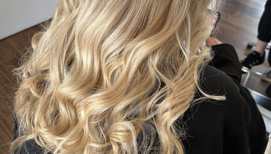 Beautifully styled blonde curls at D2 Hair Skin and Beauty in Worlingham, England, GB.