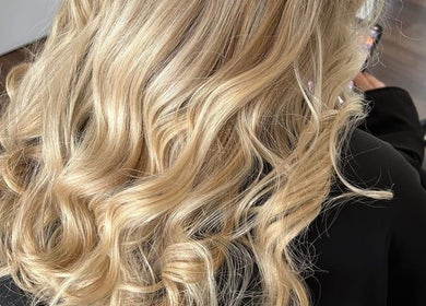 Beautifully styled blonde curls at D2 Hair Skin and Beauty in Worlingham, England, GB.