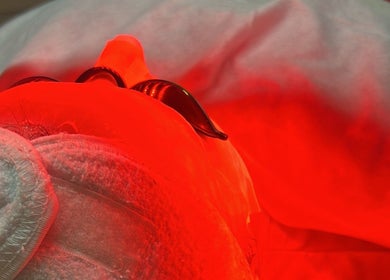 Facial treatment with red light at D2 Hair Skin and Beauty, Worlingham, England, GB enhancing skin rejuvenation.