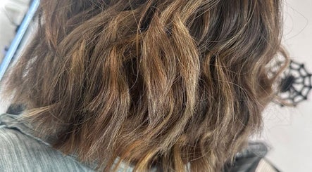 Styled wavy hair at D2 Hair Skin and Beauty, Worlingham, England, GB, showcasing a chic look.