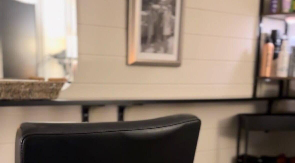 Modern salon chair and shelves at Femme Fatale Hair Portsmouth, Portsmouth, England, GB.