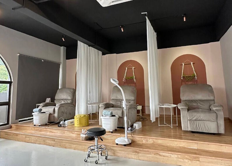 Relaxing spa chairs at Lash Out Loud (Nilai) in Nilai, Negeri Sembilan, MY, offering a serene beauty experience.