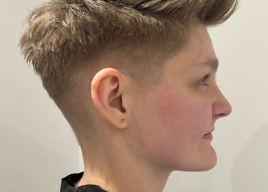 Profile view of a modern undercut hairstyle at Lauren Pomphrey Hairdressing, Andover, England, GB.