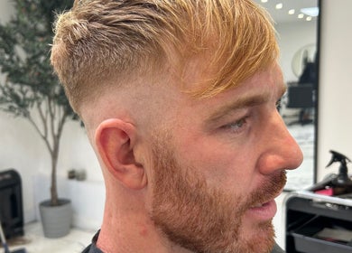 Stylishly faded haircut at Lauren Pomphrey Hairdressing in Andover, England, GB.