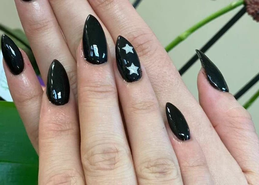 Elegant black nails with star design at Tower Beauty Christchurch, Canterbury, NZ.