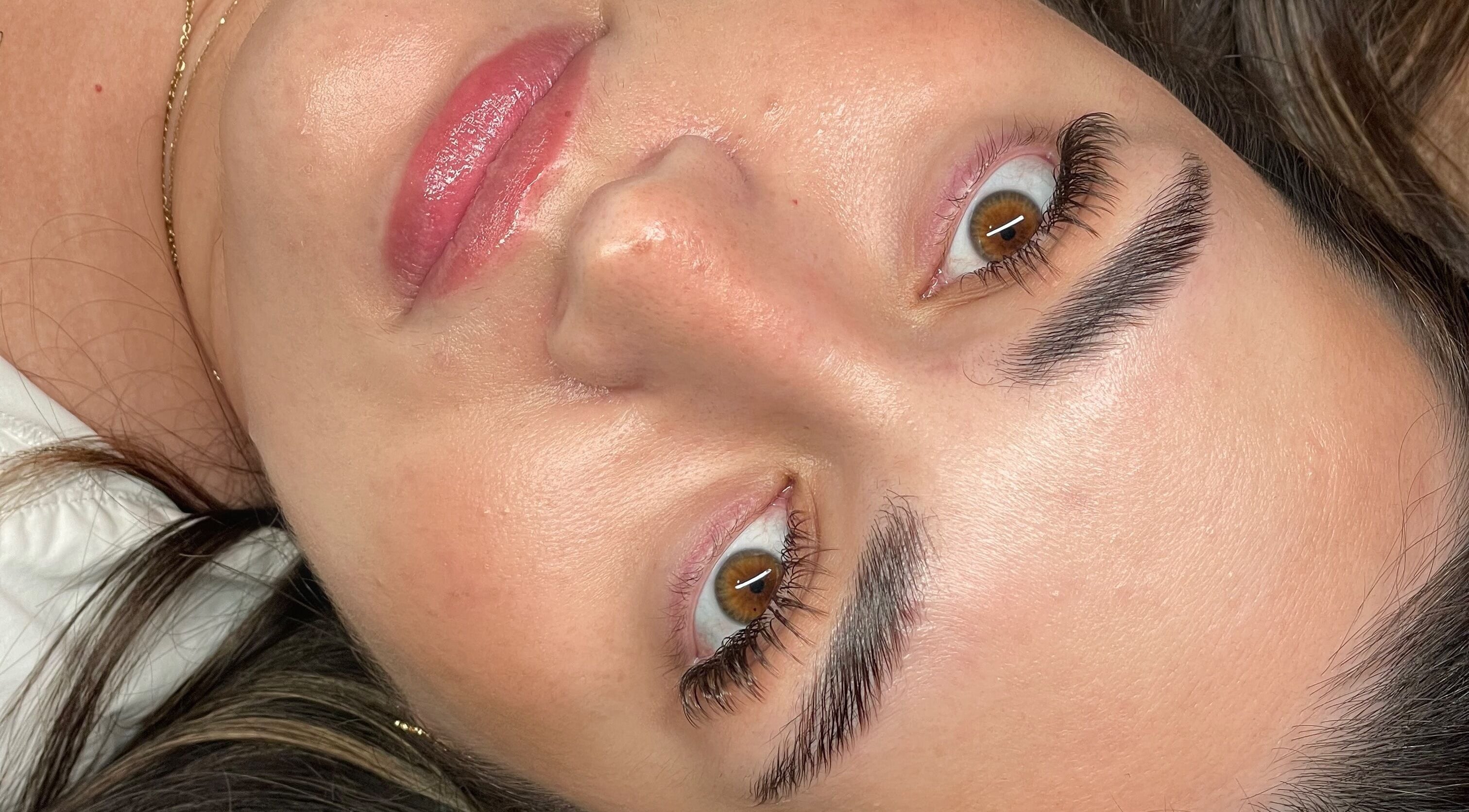 Close-up of radiant skin and groomed brows at Lulu Beauty Room, North Lakes, Queensland, AU.