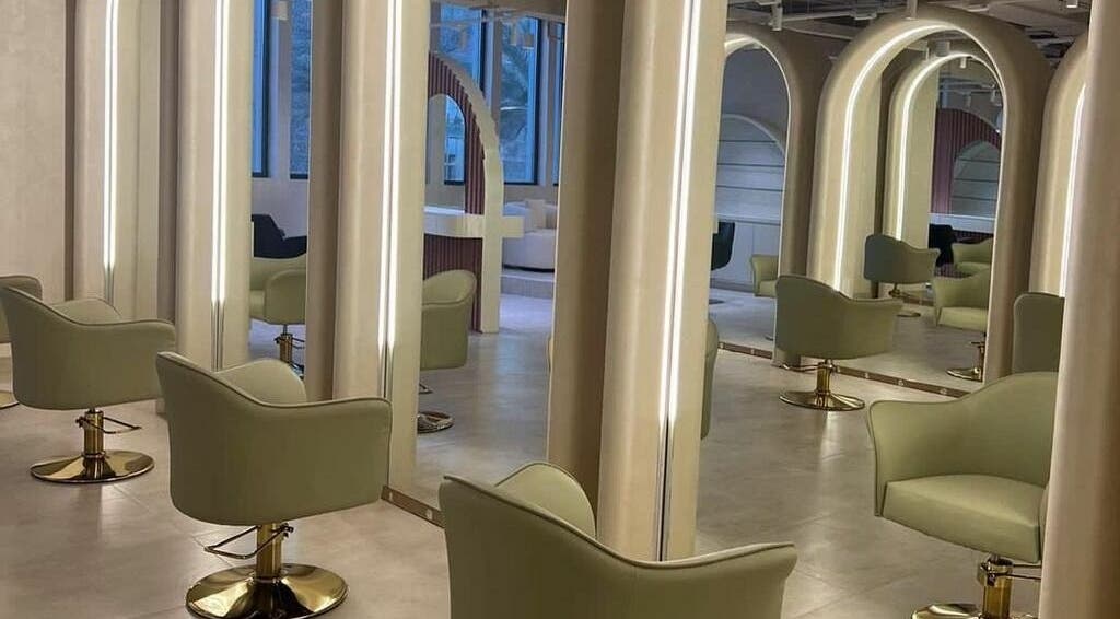 Luxurious interior of Sota Salon in Dubai, دبي, AE with modern chairs and illuminated mirrors.