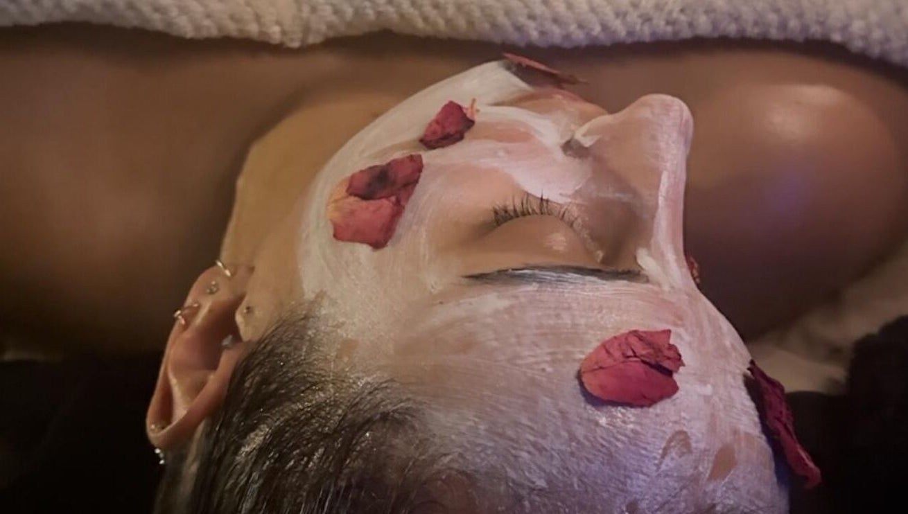 Relaxing facial with rose petals at The Signature Edit - Bedew Skin, Corby, England, GB.