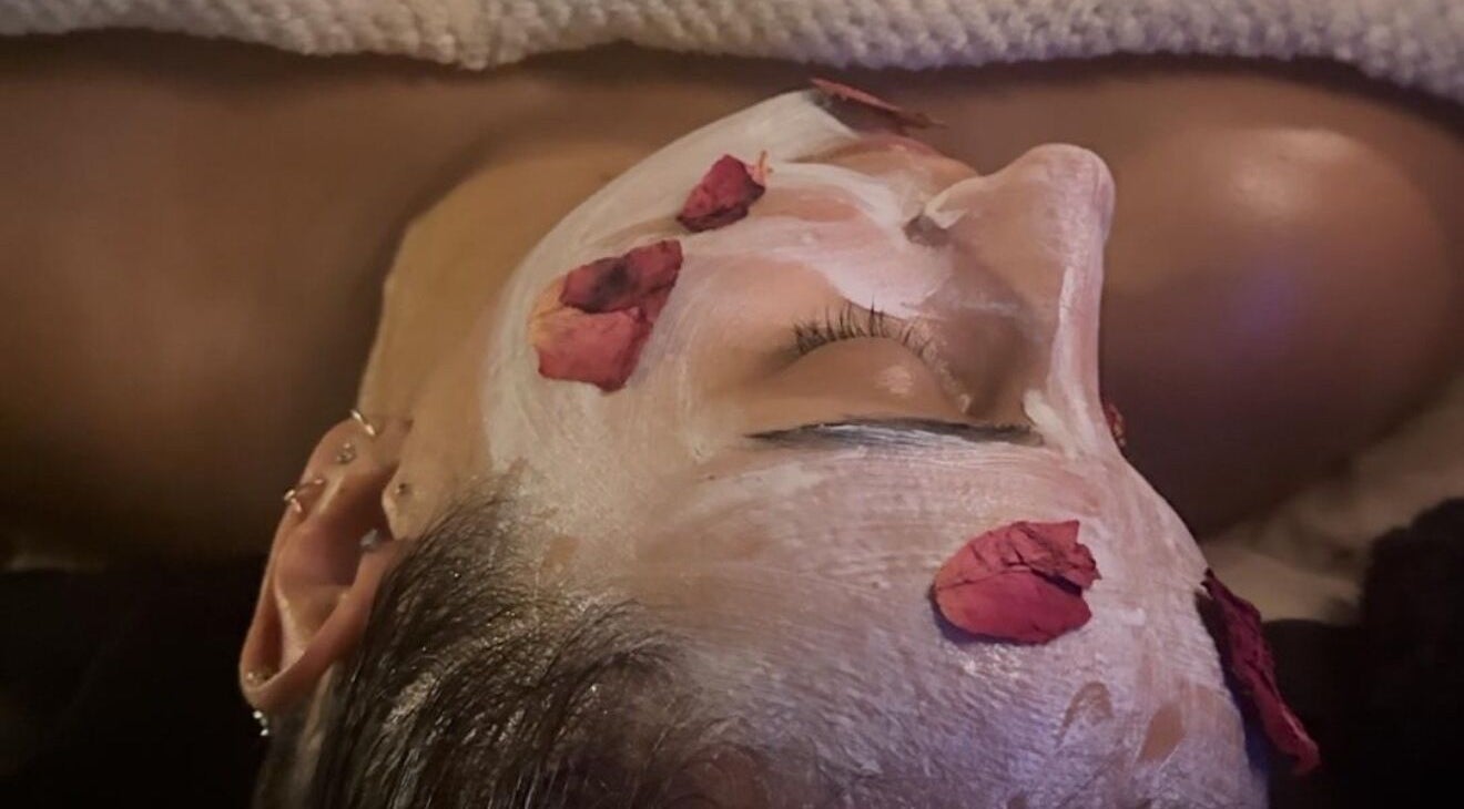 Relaxing facial with rose petals at The Signature Edit - Bedew Skin, Corby, England, GB.