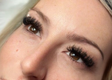 Close-up of lush eyelashes enhanced at Femme Theory in London, Ontario, CA.