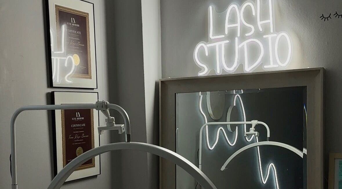 Femme Theory Lash Studio with glowing sign and certifications, London, Ontario, CA.