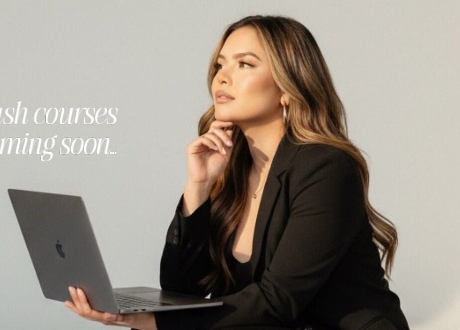 Professional woman at Femme Theory, London, Ontario, CA promoting upcoming lash courses.