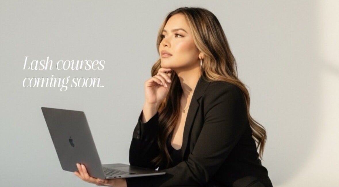 Professional woman at Femme Theory, London, Ontario, CA promoting upcoming lash courses.