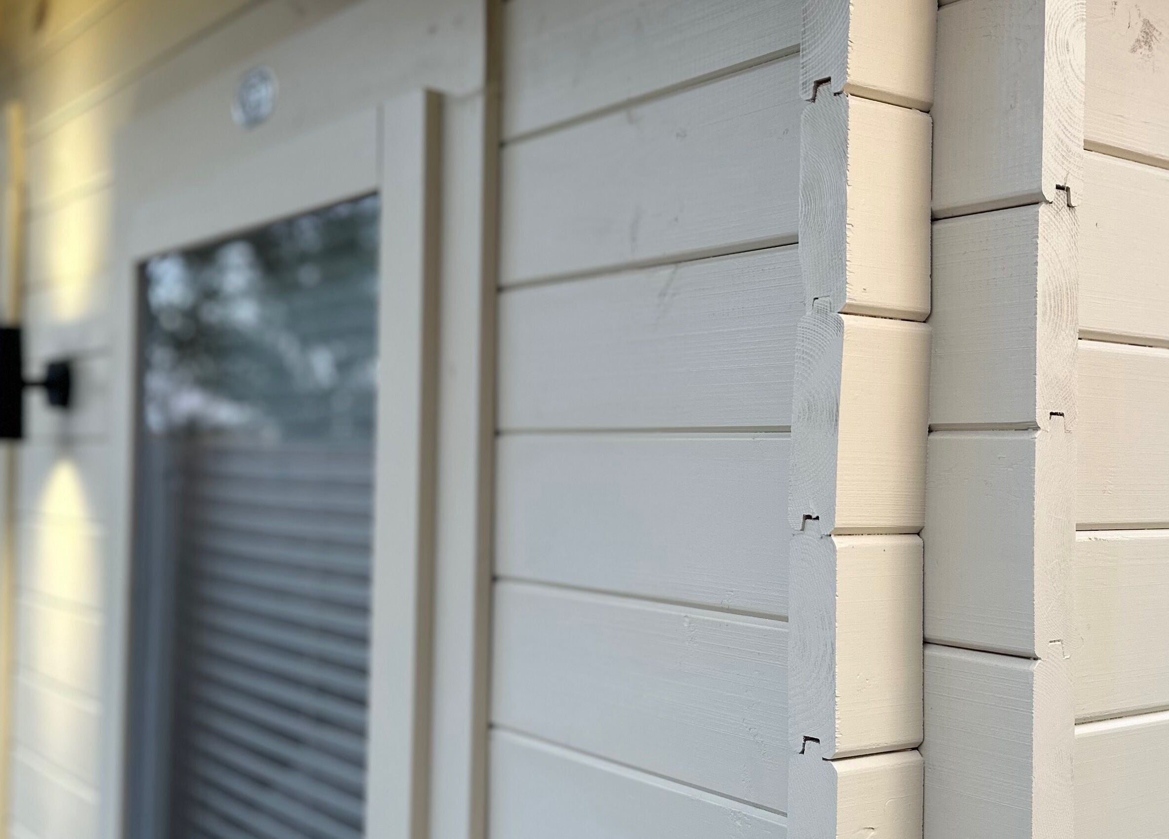 The Advanced Skin Cabin's sleek exterior in Peterborough, England, GB, showcasing a modern wooden design.