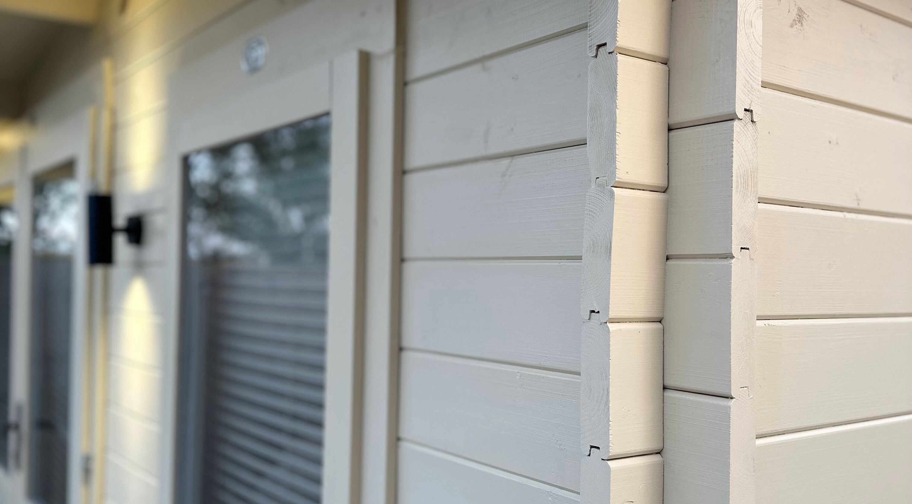 The Advanced Skin Cabin's sleek exterior in Peterborough, England, GB, showcasing a modern wooden design.