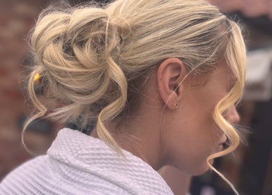Blonde updo hairstyle at Signature Blonde salon in Leeds, England, GB.