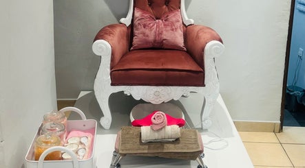 Elegant pedicure setup at Sempré Bella by Noushka, Johannesburg, Gauteng, ZA, featuring a plush chair and spa essentials.