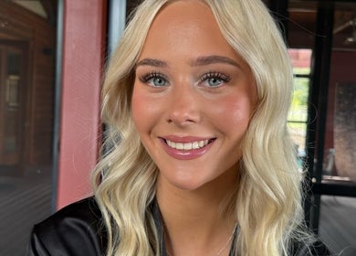 Smiling woman with styled hair at Beauty For All - Bribie Island & Mobile - Hair & Makeup Artists, Woorim, Queensland, AU.