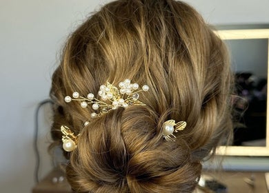 Chic bridal updo with pearl accents by Beauty For All - Bribie Island & Mobile - Hair & Makeup Artists, Woorim.