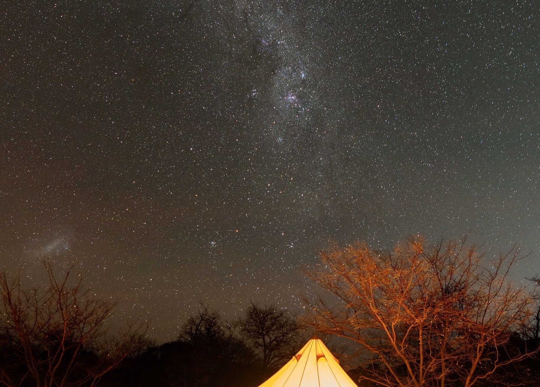 Starry night sky above a peaceful tent at Be Well with Brooke, Oura, New South Wales, AU.