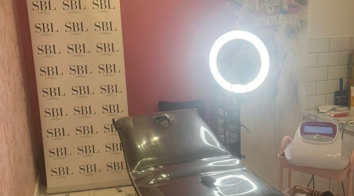 Eme Beauty Studios treatment room with sleek chair and light setup in Dudley, England, GB.