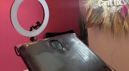 Chic setup at Eme Beauty Studios with pink walls, ring light, in Dudley, England, GB.