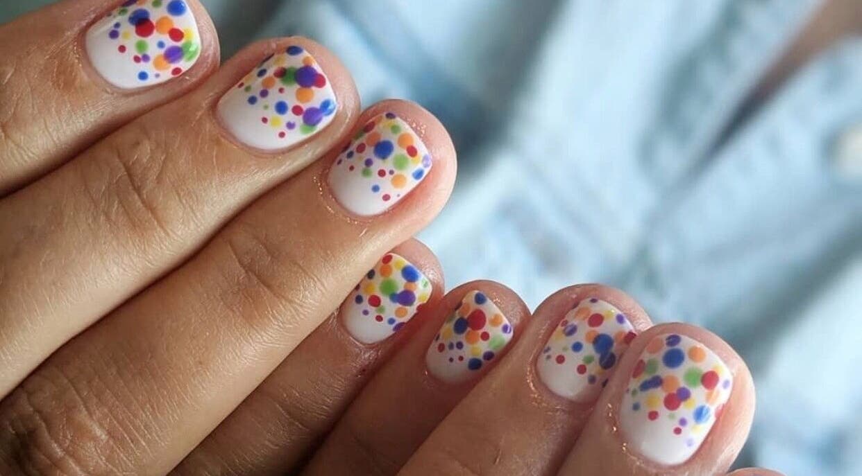 Colorful polka dot nails by Mobile Hertfordshire Nail Technician, St. Albans, England, GB.