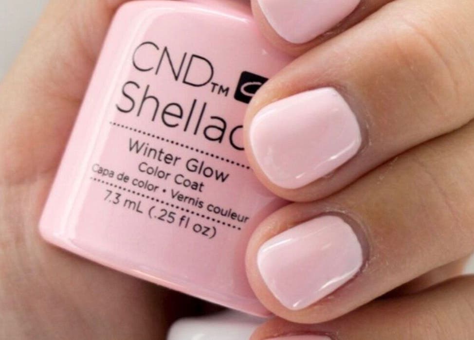 Close-up of hand with pink nails using Winter Glow by Mobile Hertfordshire Nail Technician, St.albans, England, GB.