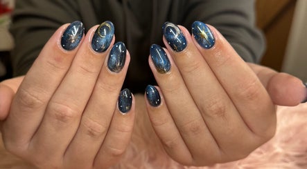 Starry nail art at Nails n Beauty by Soph, Taverham, England, GB. Perfect for chic cosmic style.