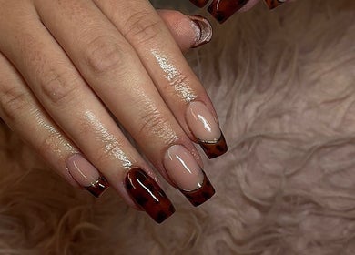 Close-up of elegant tortoiseshell nails at Nails n Beauty by Soph, Taverham, England, GB.