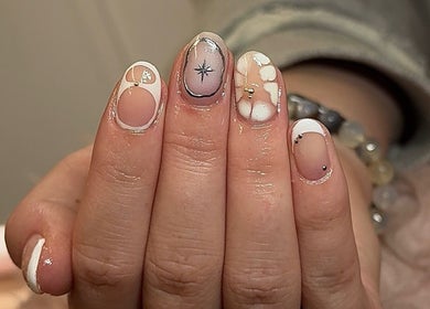 Intricate nail designs at Nails n Beauty by Soph in Taverham, England, showcasing elegant artistry.