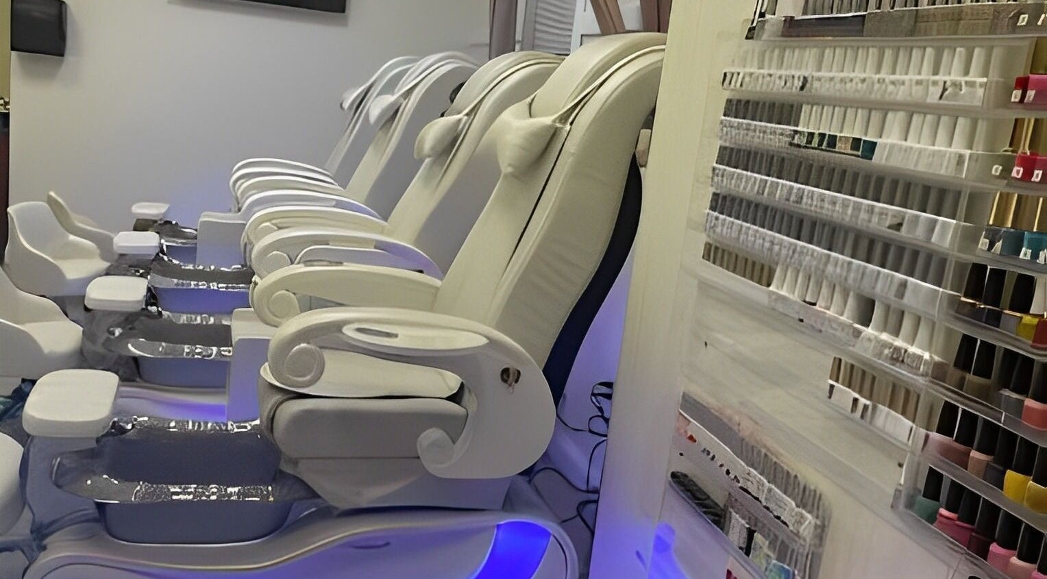 Elegant pedicure chairs and polish selection at Emily Nails and Spa, Peabody, Massachusetts, US.