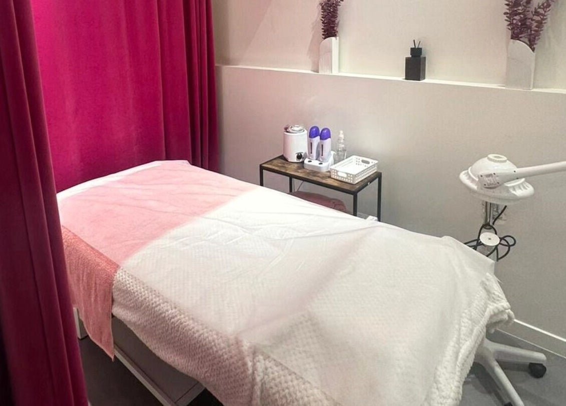 Relaxing treatment room at Vish Beauty Bar Dunedin, Dunedin, Otago, NZ, featuring a cozy massage table.
