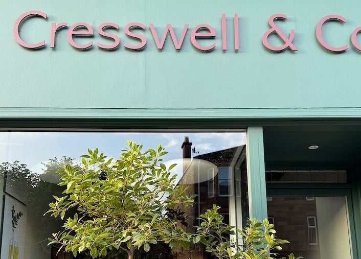 Cresswell Studios storefront with greenery in Glasgow, Scotland, GB, showcasing beauty and wellness.